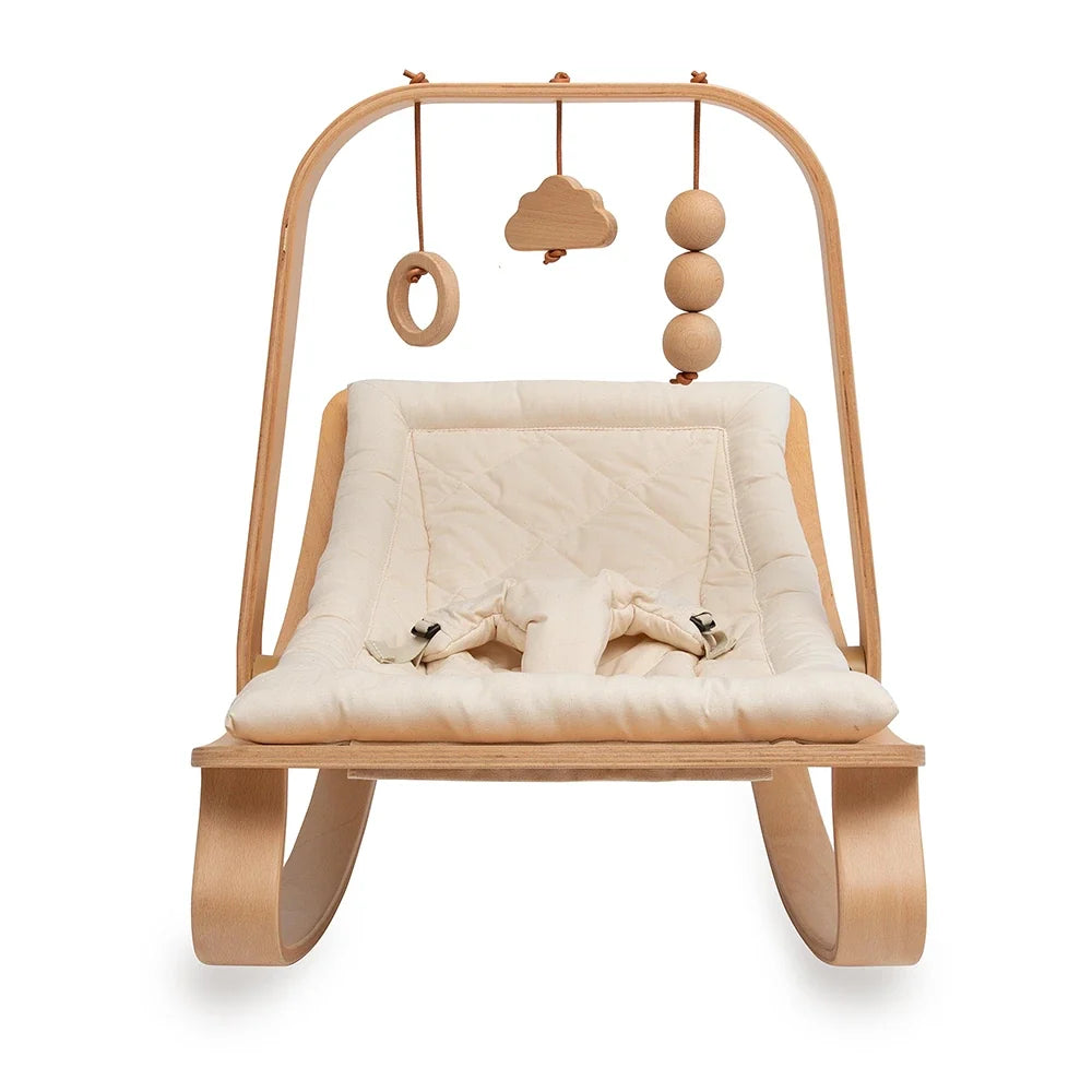 Charlie Crane LEVO activity arch in beech wood, front view on the LEVO rocker