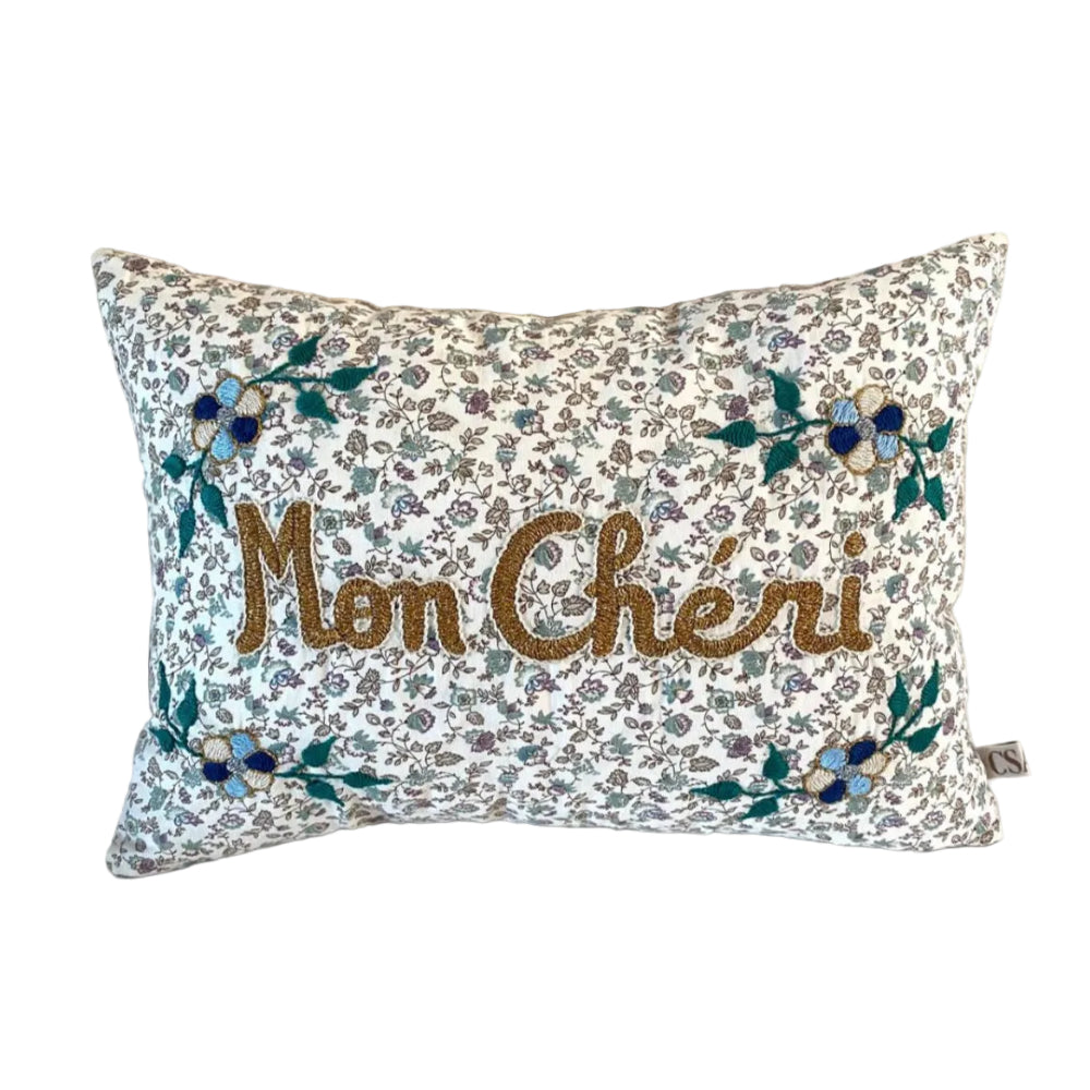 Decorative pillow with floral pattern and &