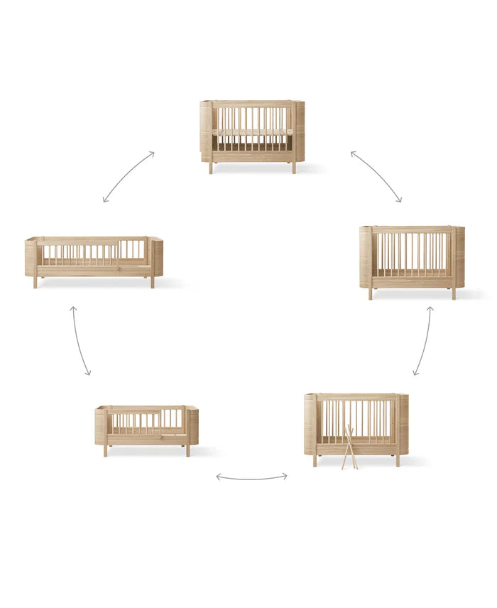 Wood Mini+ Cot Bed Incl. Junior Kit I Oak
