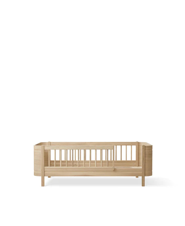 Wood Mini+ Cot Bed Incl. Junior Kit I Oak