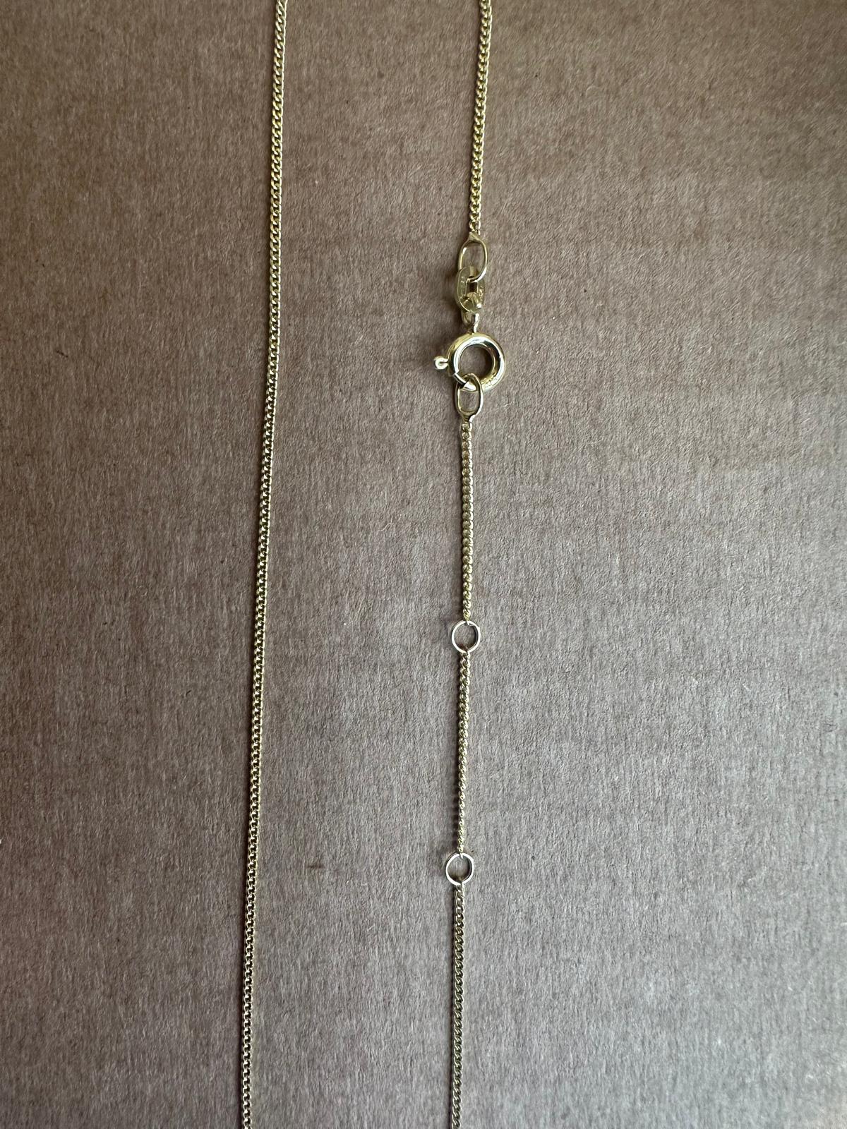 Detail of the adjustable clasp with extra jump rings on the Hazel & George Necklace 14K Gold, 41-43-45 cm version