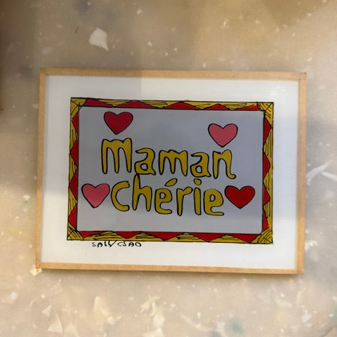 A square framed art print with the French text &