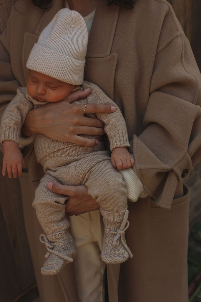 Hvid knitted merino wool baby pants in sand colour for the Archive Store