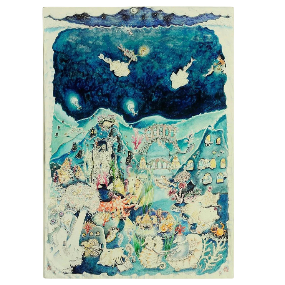 A reversible muslin blanket with a marine life theme illustrated on it, featuring fish, sea grasses, marine mammals, and mollusks, with a night sky depicted on the other side.