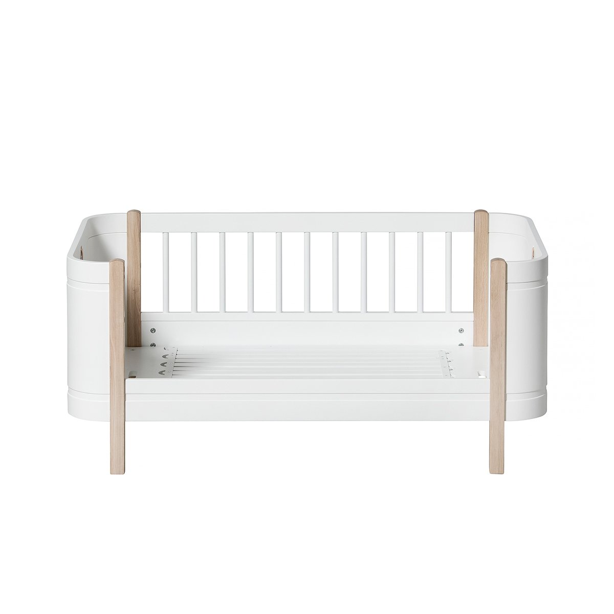 Wood Mini+ Cot Bed Incl. Junior Kit | White/Oak