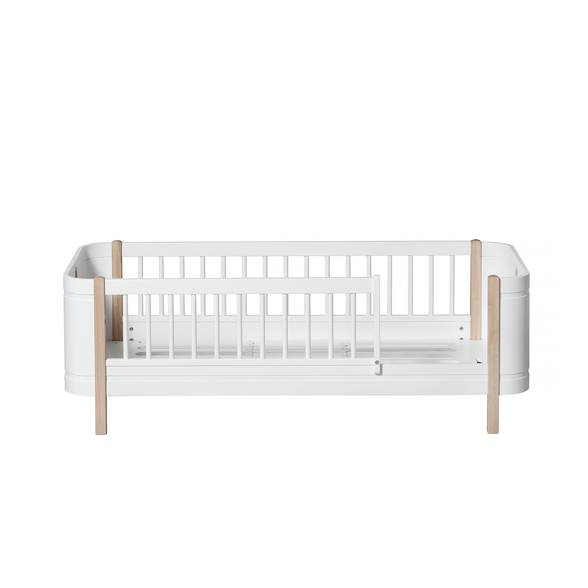 Wood Mini+ Cot Bed Incl. Junior Kit | White/Oak