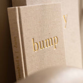 Bump: A Pregnancy Story pregnancy journal, open to an inside page with pregnancy milestones