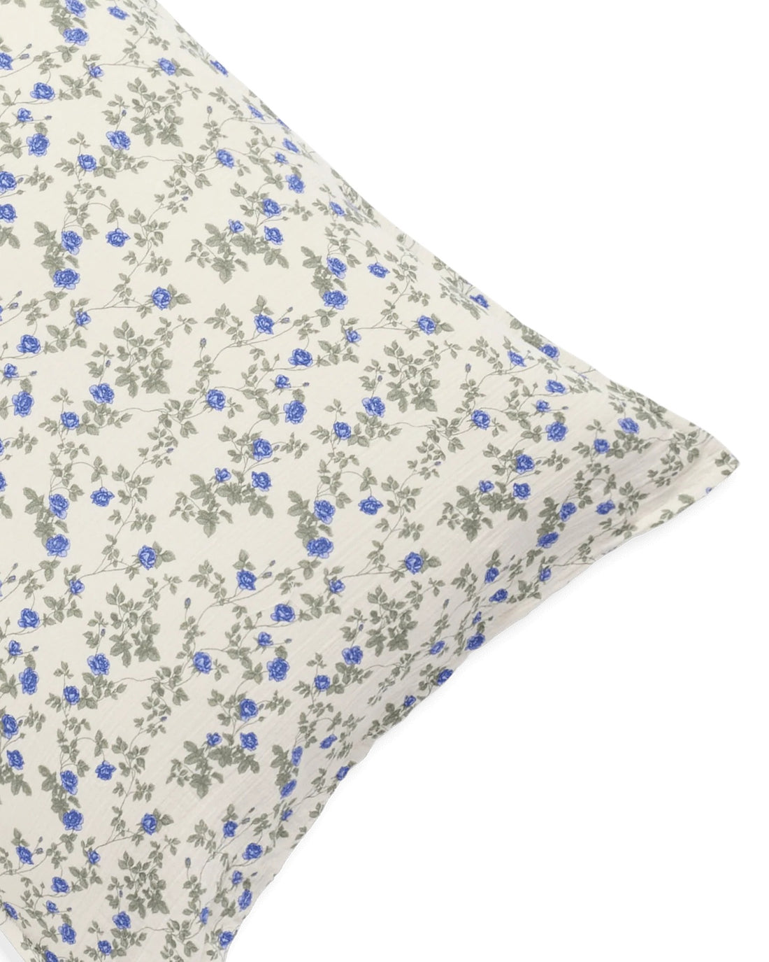 Floral patterned pillow on a white background