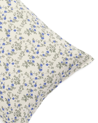 Floral patterned pillow on a white background