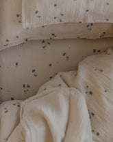 Close-up of the Garbo and Friends fitted sheet in the Viola print, The Archive Store