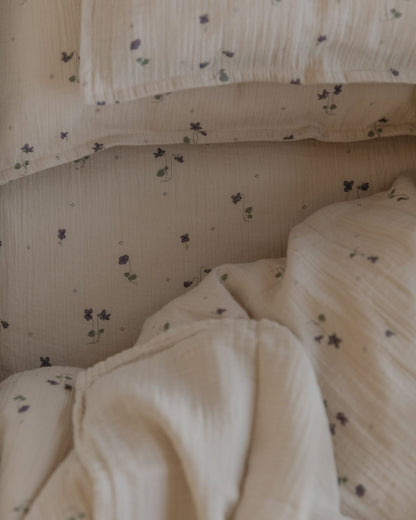 Close-up of the Garbo and Friends fitted sheet in the Viola print, The Archive Store