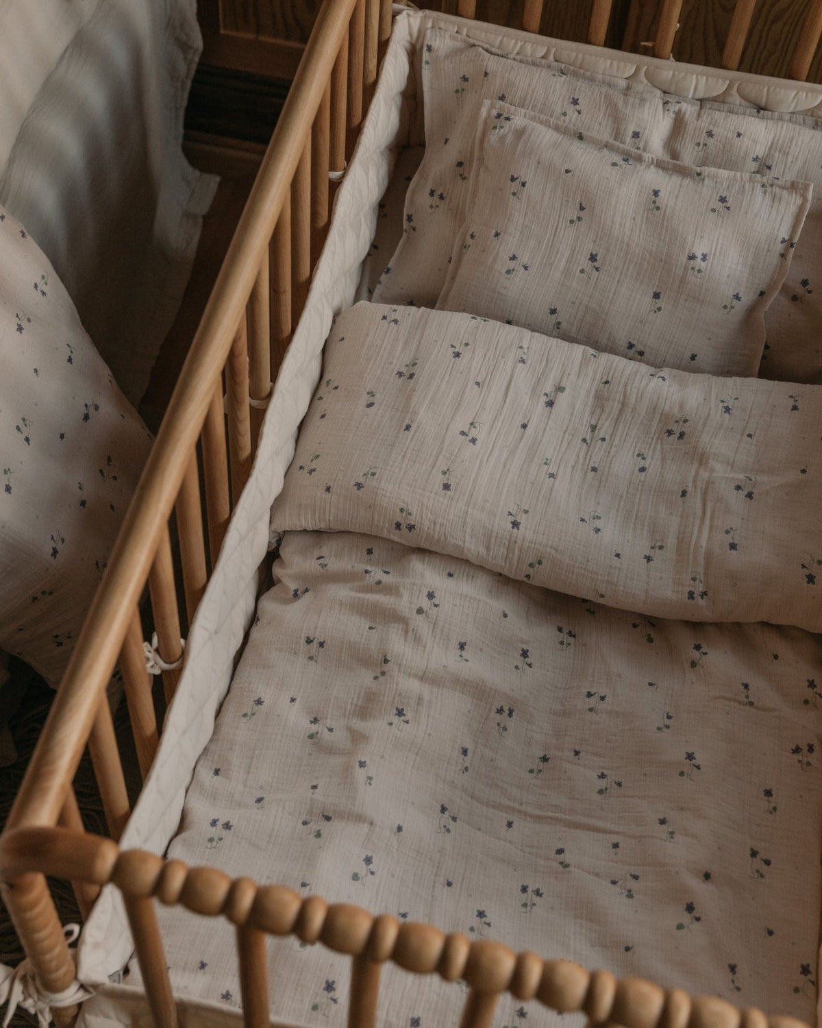 Garbo and Friends satin quilted crib bumper in Ecru, The Archive Store