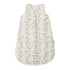 A quilted baby sleep sack in cream with a delicate blue and brown floral vine pattern