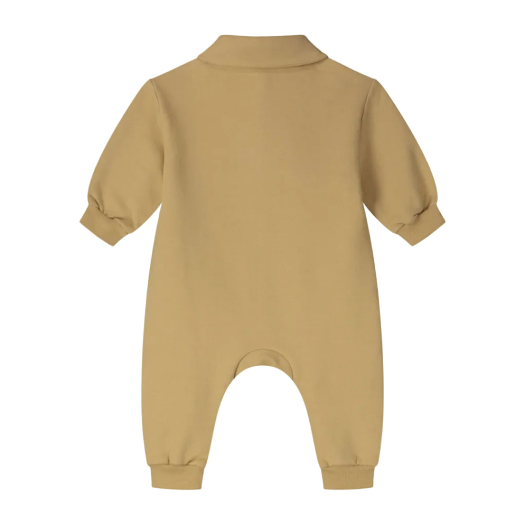A mustard yellow baby long-sleeve footless romper