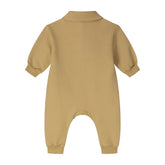 A mustard yellow baby long-sleeve footless romper