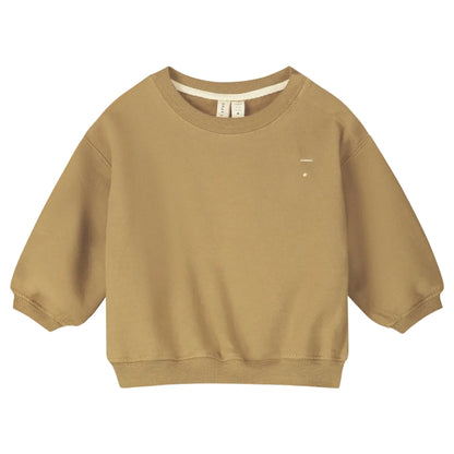 A long-sleeve sweatshirt in a warm camel tan color, featuring a crew neck and a small white embroidered logo on the left chest.