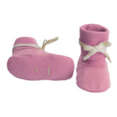 Pair of pink baby booties with white ribbons