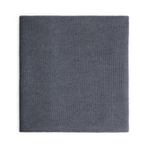 Hazel & George Merino Blanket in Charcoal, folded knitted blanket on a white background
