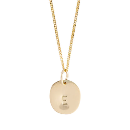 Hazel &amp; George Initial Hanger Large 14K Gold, gold necklace with a round pendant engraved with the letter E, on a white background