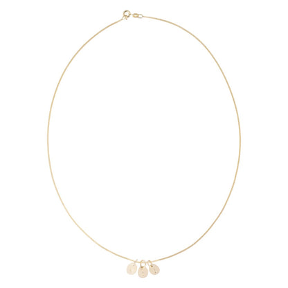 Hazel &amp; George Necklace 14K Gold, gold necklace worn in a circle with three small initial charms attached, on a white background