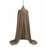 Hazel & George Linen Bed Canopy in Mosswood, hanging in soft folds down to the floor, on a white background