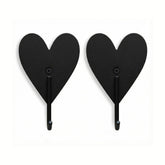 Hazel & George Metal Heart Hook Set of 2 in black, heart-shaped wall hooks on a white background