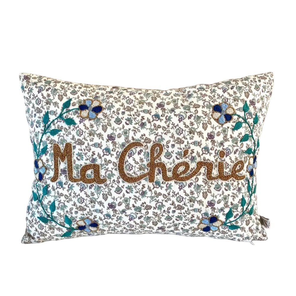 Decorative pillow with floral pattern and &
