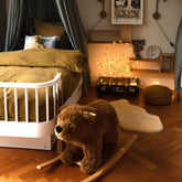 Steiff Urs Riding Bear – brown wool felt riding bear on wheels, detail view