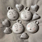 Anouk Kramer Porcelain Moon Face Ornament – set of pieces, eyes closed