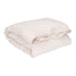 Hazel & George Linen Duvet Cover in Craie, folded, on a white background