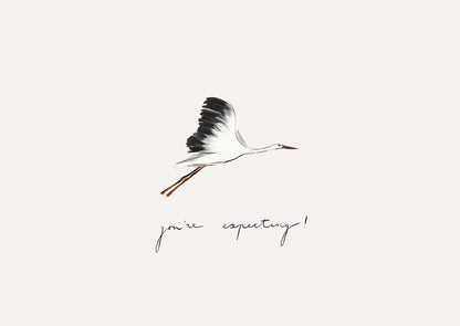 A minimalist art print featuring a black and white flying stork with orange accents, above the handwritten text &