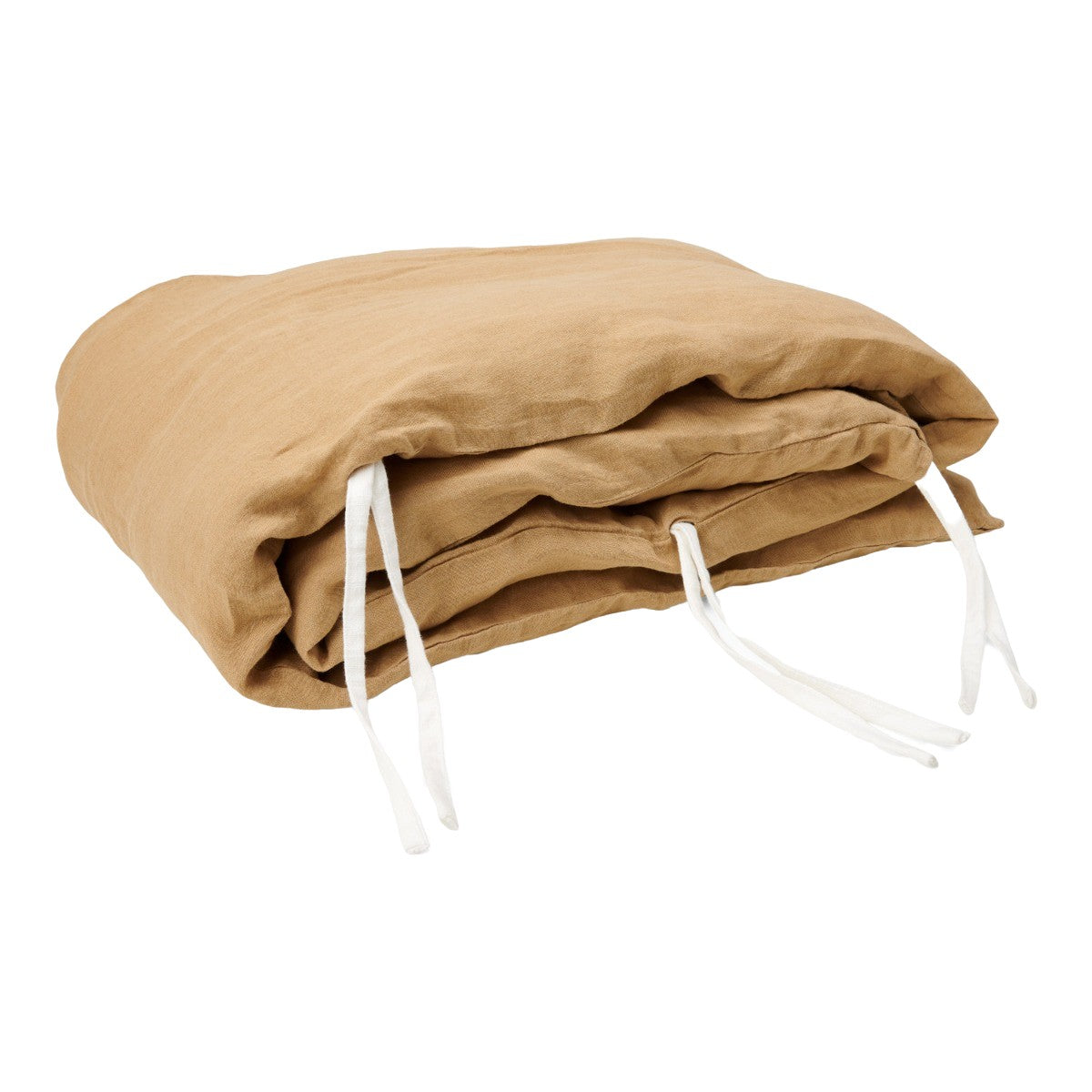 Hazel &amp; George Linen Cover for Cot Bumper in Dore, a padded linen bumper roll with white ties, folded on a white background