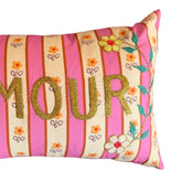 Close-up of the CSAO Mini Cushion Amour in Pink Stripe print, showing the embroidered detail