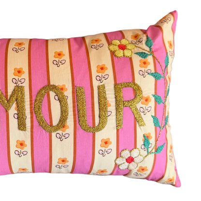 Close-up of the CSAO Mini Cushion Amour in Pink Stripe print, showing the embroidered detail