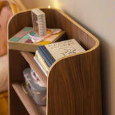 Curve Lab Small Curvy Bookcase Walnut – detail of the wavy shelves