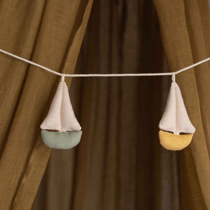 Cala Garland by Dear April, styled in a nursery