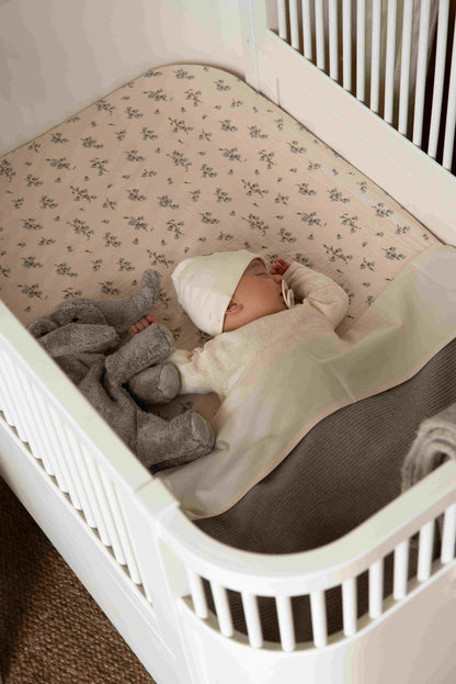 Fitted Sheet Bluebell on a baby bed