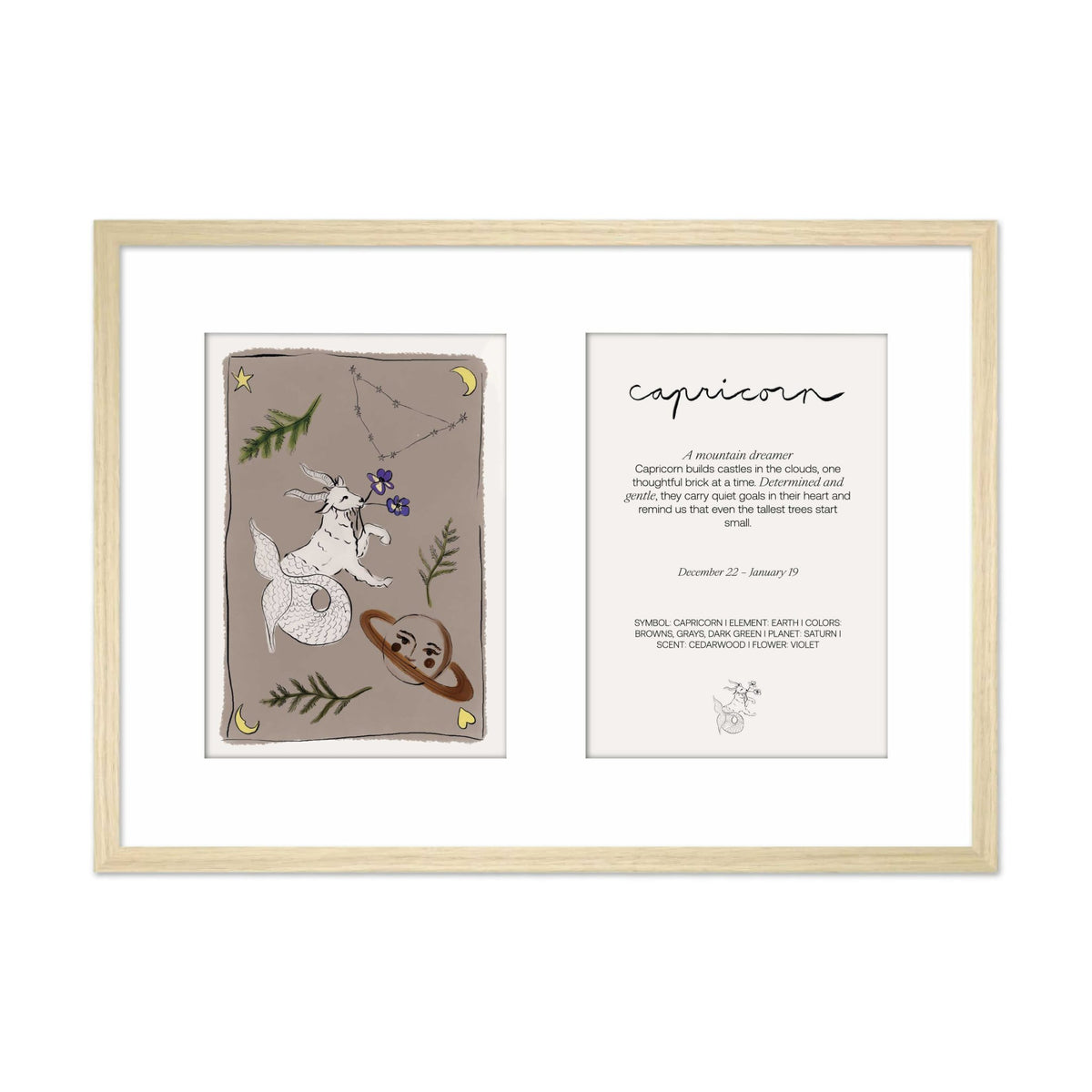 Ingelijste Hazel &amp; George Steenbok-poster met twee panelen in één lichte houten lijst: links de illustratie met een steenbok, de planeet Saturnus en bloemen, rechts een tekstkaart met &