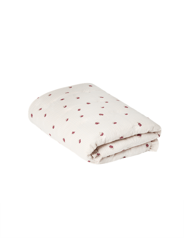 Garbo &amp; Friends Muslin Filled Blanket Rosehip, folded, ivory organic cotton muslin with small rosehip-red flowers