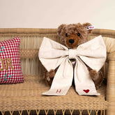 Hazel & George Canvas Festive Bow Small tied around a teddy bear&