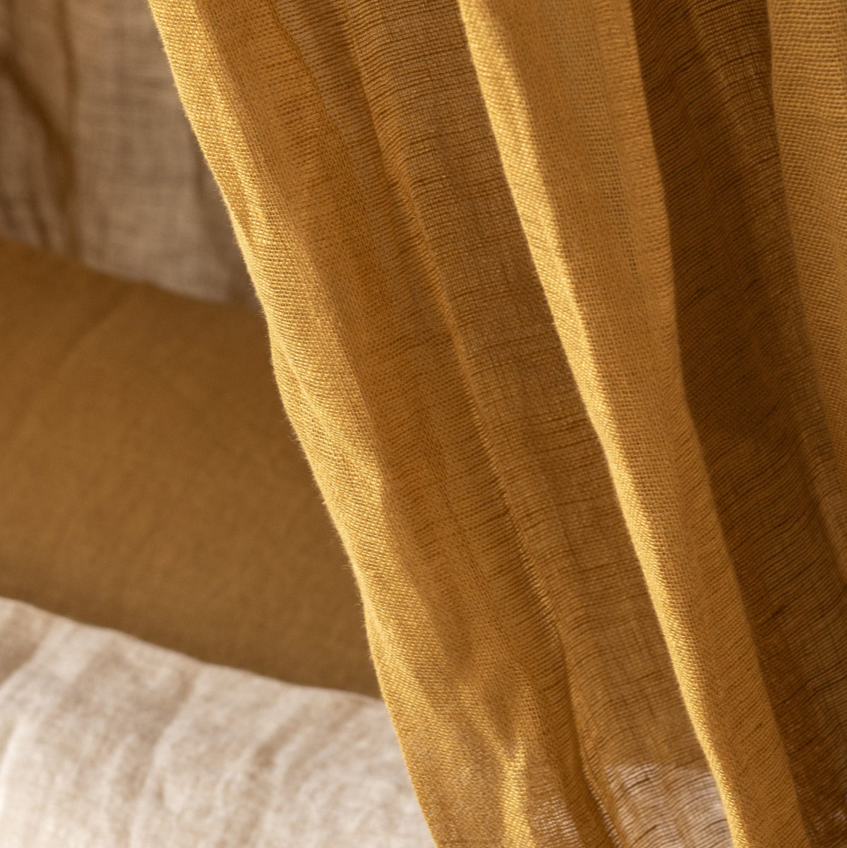 Close-up of the Hazel &amp; George linen fabric in Dore, showing the natural woven structure