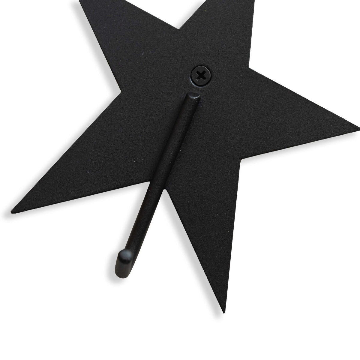 Close-up of a Hazel &amp; George Metal Star Hook in black, showing the hook detail on a white background