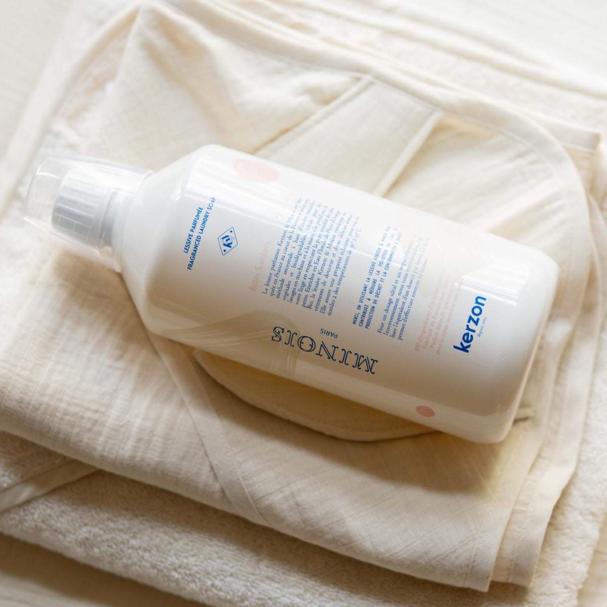 Minois x Kerzon fragranced laundry soap bar shown in its packaging