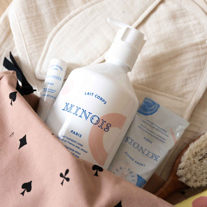 Minois Paris Moisturizing Body Lotion bottle on a white background
