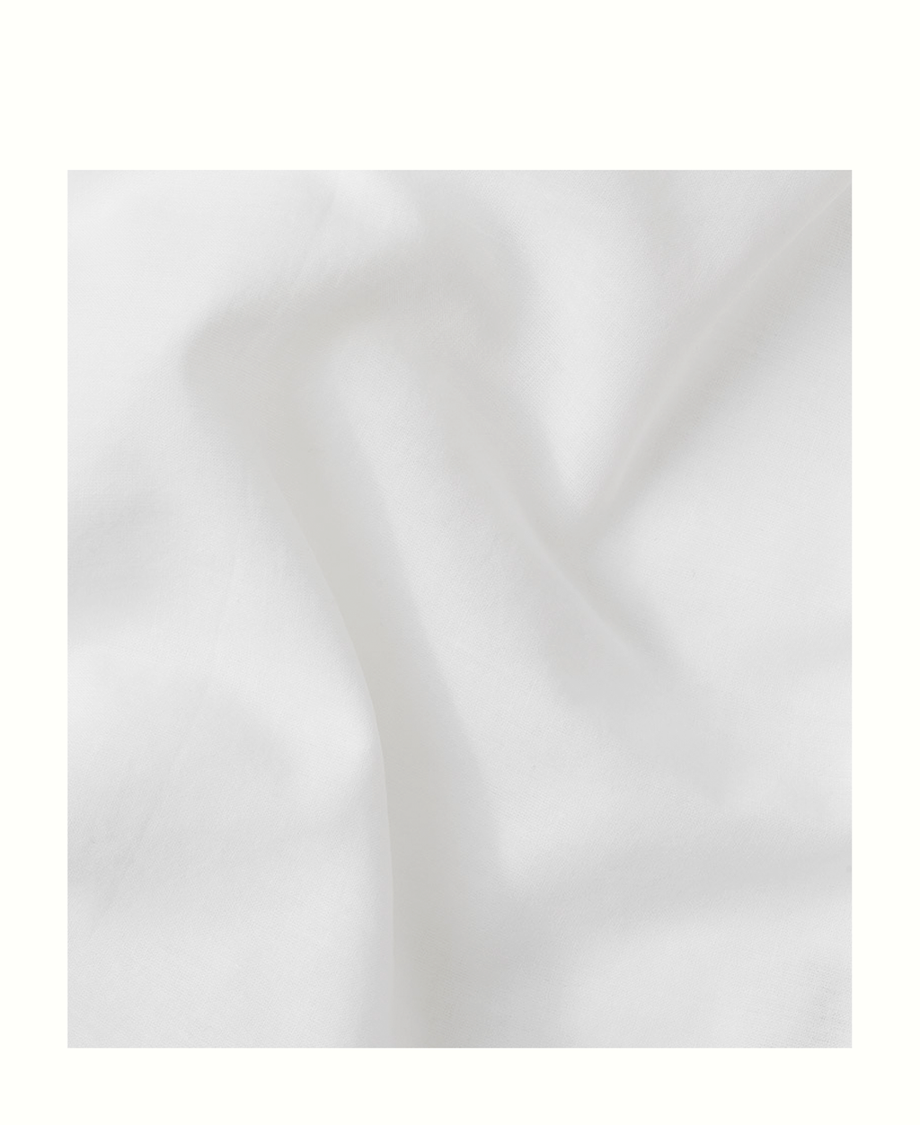 Close-up of the transparent white fabric of the Oliver Furniture Camp Novel cot canopy