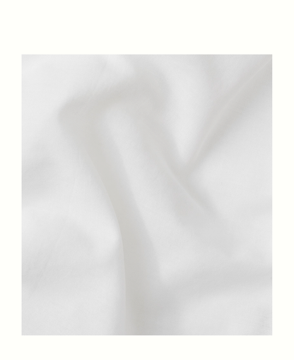 Close-up of the transparent white fabric of the Oliver Furniture Camp Novel cot canopy