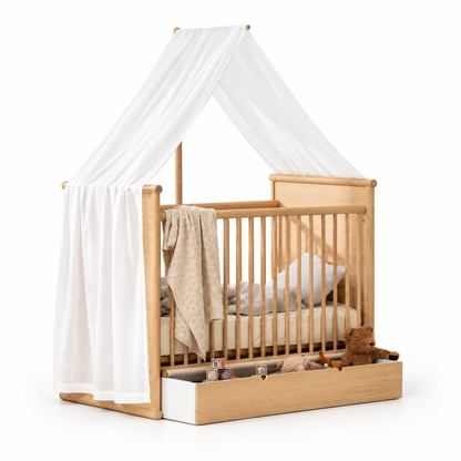 Oliver Furniture Camp Novel transparent white canopy shown on an oak cot against a white background
