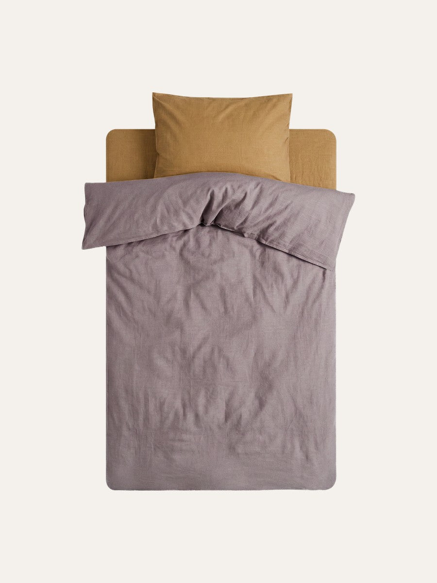 A kids bed in Hazel and George linen, ready to be composed