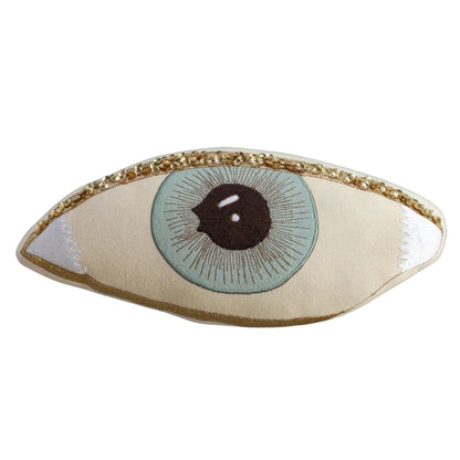 embroidered and embellished handmade cushion of an eye by Skippy Cotton