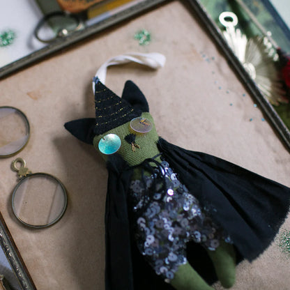 Elphaba Token, Ornament